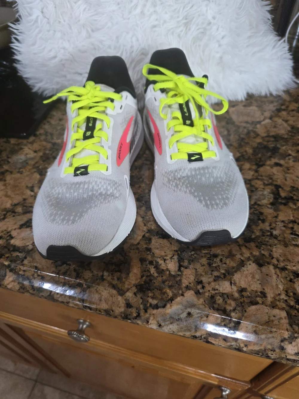 Brooks Women's White Running Shoes with Neon Pink and Yellow Accents